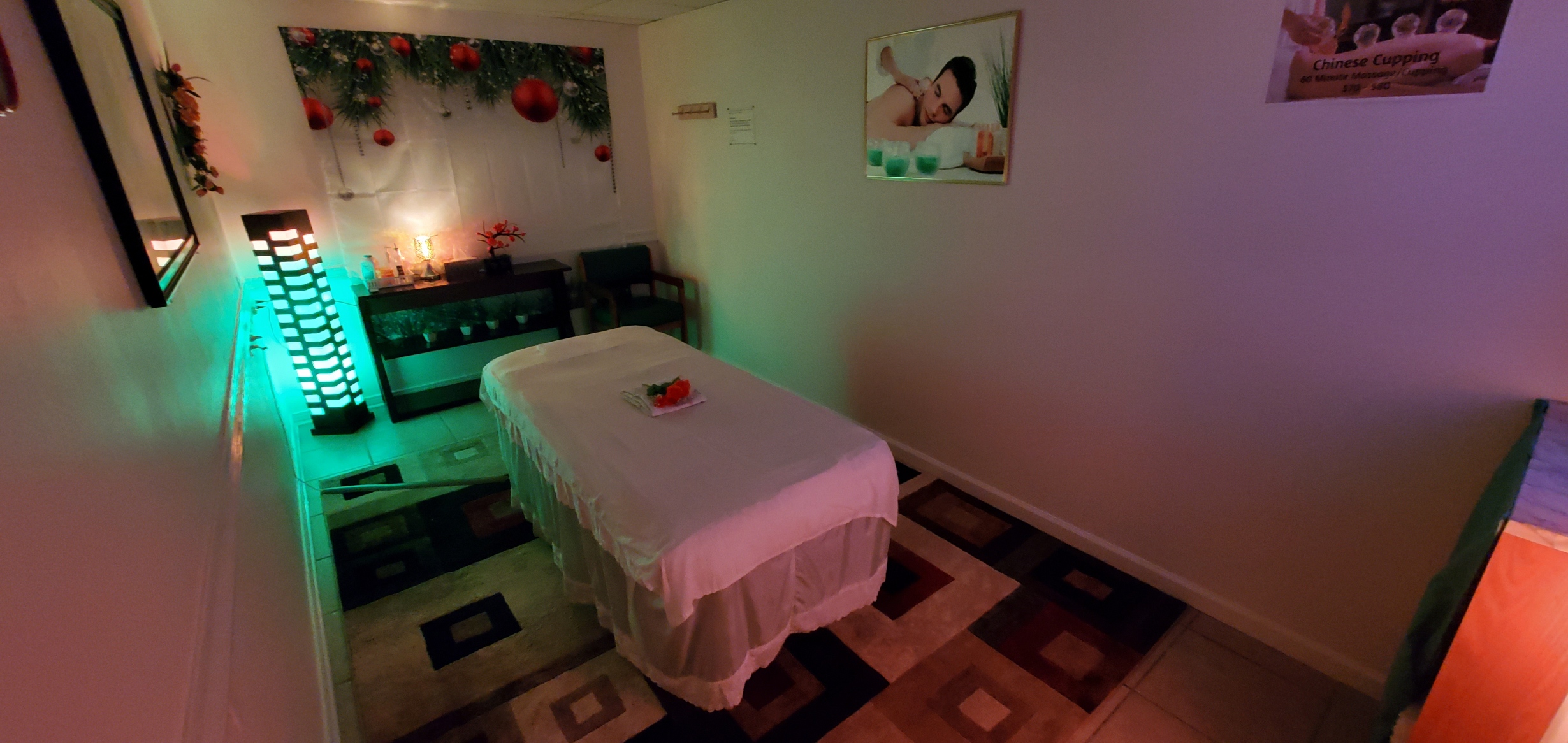 Private massage room with soft lighting at Five Points Massage