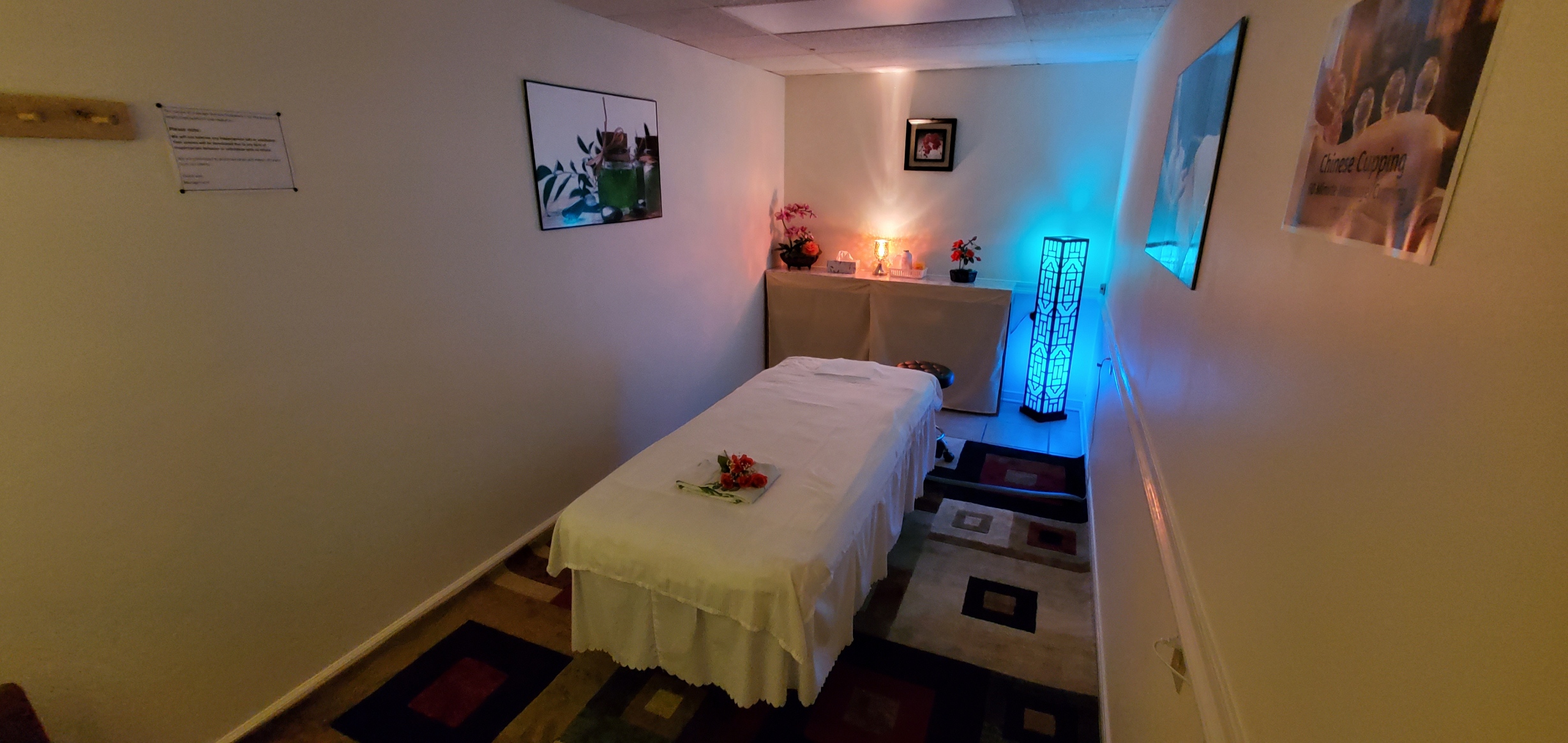 Private massage room with relaxing lighting at Five Points Massage